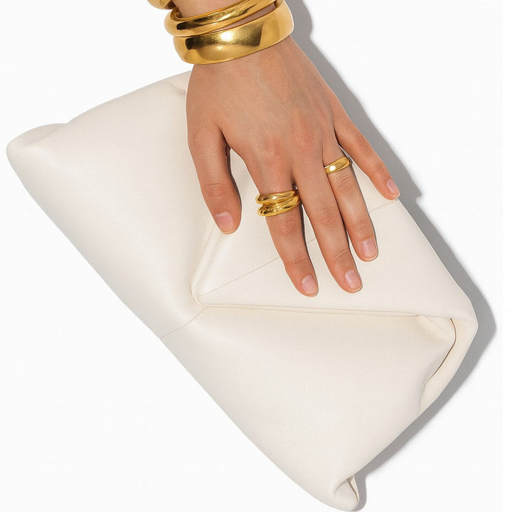 Bottega Veneta Trine Triangle Clutch in White Leather | Daniel Lee Era Bottega Veneta